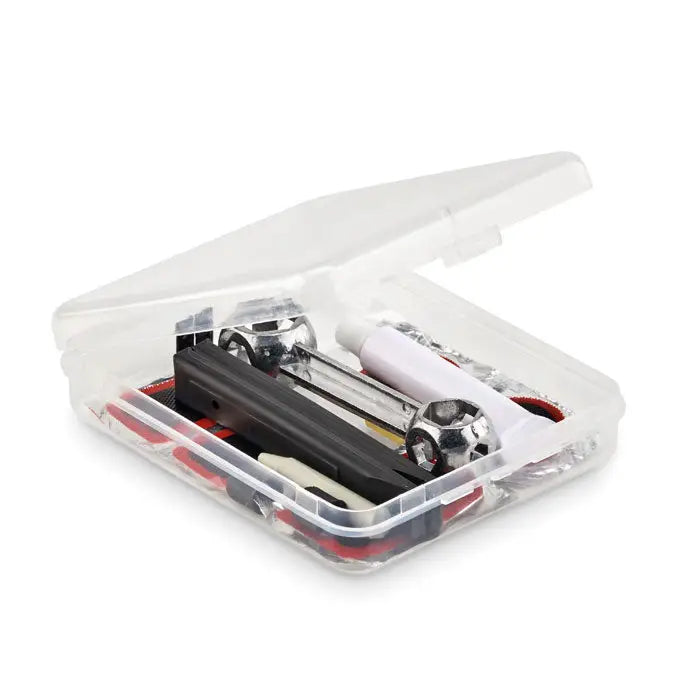 Kit de reparare biciclete cu unele negre argintii si albe intr-o cutie transparenta din plastic