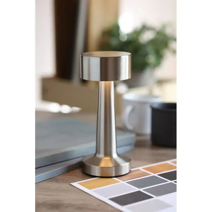 Lampa de masa reincarcabila din fier cu opritor de usa modern din otel inoxidabil cu varf cilindric si baza conica