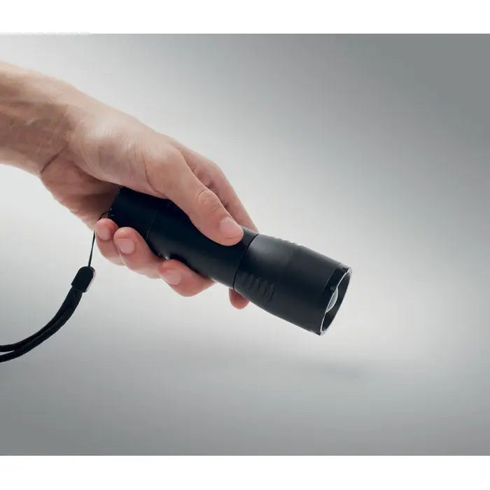 Lanterna led mica din aluminiu neagra cilindrica cu grip texturat si curea de mana atasata
