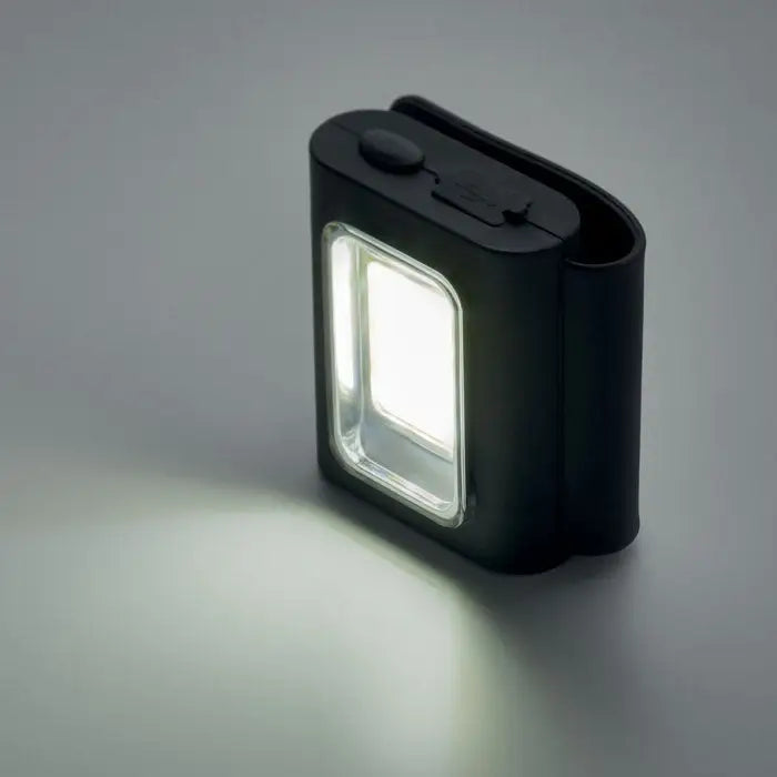 Lumina cob multifunctionala lampa de lucru led neagra cu panou iluminat dreptunghiular alb si suprafata texturata de prindere