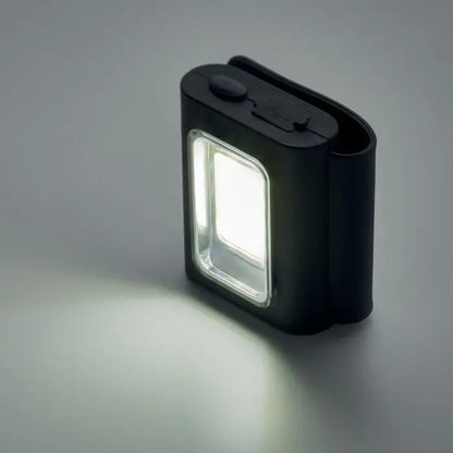 Lumina cob multifunctionala lampa de lucru led neagra cu panou iluminat dreptunghiular alb si suprafata texturata de prindere
