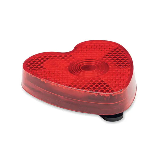 Reflector lumina in forma de inima rosu cu suprafata translucida texturata si baza de prindere neagra pentru bicicleta
