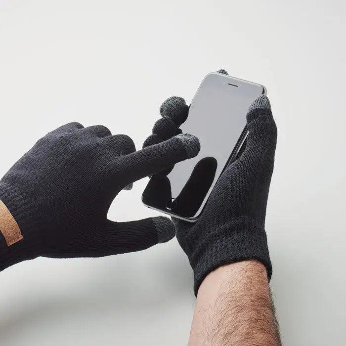 Black knitted touchscreen gloves with a tan wristband made from RPET for manusi tactile use