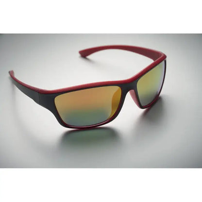 Ochelari de soare sport rosii si negri cu lentile oglinda gradient uv400 care reflecta nuante portocalii galbene si verzi