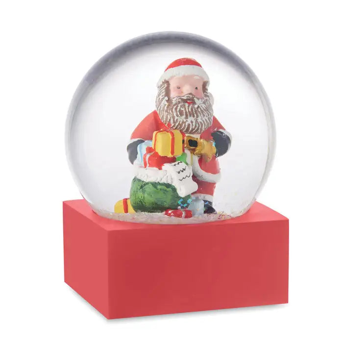 Ornament de sticla cu bile de zapada cu baza rosie din plastic si glob de sticla cu mos craciun rosu si alb cu daruri
