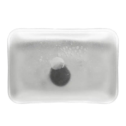 Pad cald si rece transparent rectangular gel pack cu obiect circular intunecat si bule mici in interior