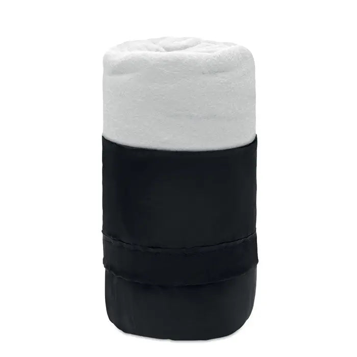 Patură de călătorie din lână rpet compactă rulată cu partea superioară albă plușată și înveliș negru elegant