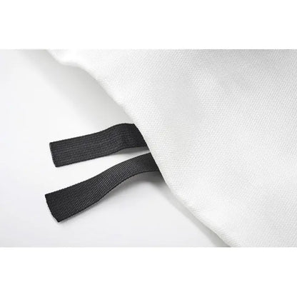 Patura de foc in husa 120x180 cu bretele elastice negre din marginea materialului alb