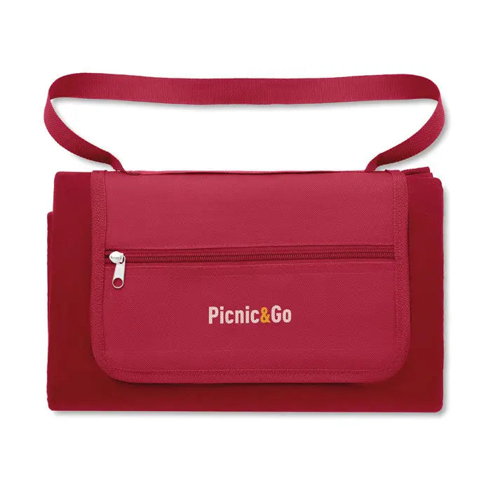 Patura de picnic pliabila rosie cu buzunar frontal cu fermoar si bretea de umar asortata