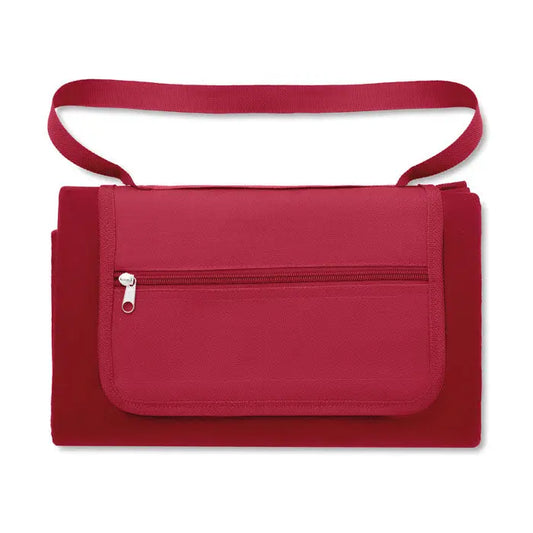Patura de picnic rosie din material textil cu bretea de umar si buzunar frontal cu fermoar