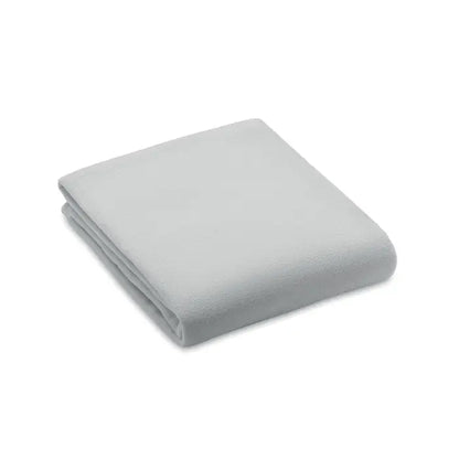 Patura din lana rpet 130gr/m² gri deschis, moale si textura fleece ingrijit impaturita