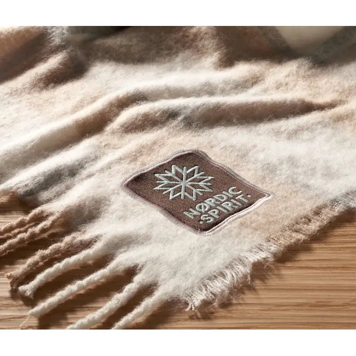Beige patura mohair in carouri with a brown woolen scarf patch embroidered with a snowflake and nordic spirit text
