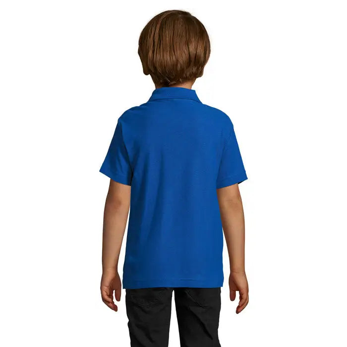 Copil purtand un polo summer ii kids 170g albastru regal vibrant cu maneci scurte si guler clasic