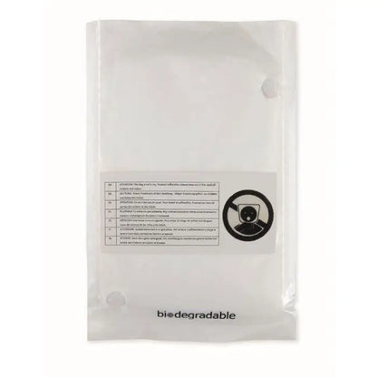 Clear plastic poncho and bag biodegradable with white label and multilingual instructions on the back side
