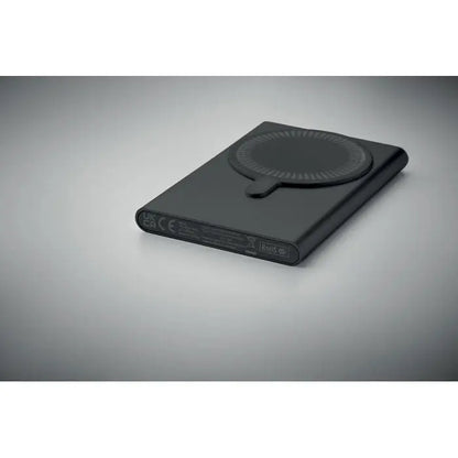 Power bank incarcator wireless negru dreptunghiular cu pad circular metalic si finisaj elegant pentru incarcare rapida