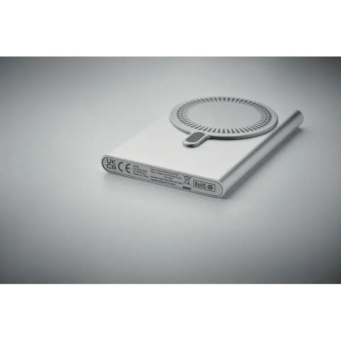 Pad de încărcare wireless argintiu cu design circular și finisaj metalic pentru power bank incarcator wireless