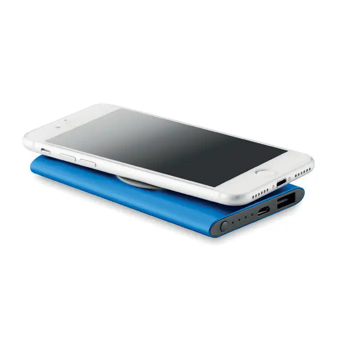 Power bank wireless 4000mah albastru dreptunghiular cu încărcare wireless și smartphone alb așezat deasupra