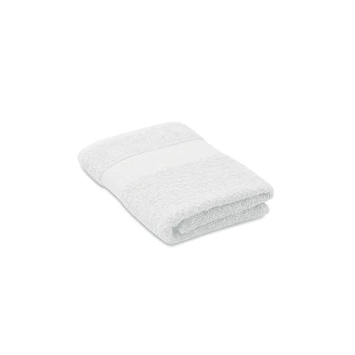 Prosop bumbac organic 100x50cm alb cu suprafata texturata moale si banda orizontala subtila la centru