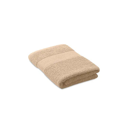 Prosop bumbac organic bej 100x50cm cu textura pufoasa si dungi orizontale subtile, pliat