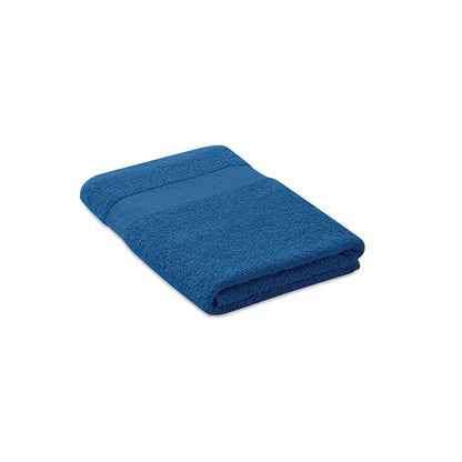 Prosop bumbac organic 140x70cm royal blue cu suprafață texturată și bordură țesută subtilă