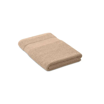 Prosop bumbac organic beige cu margine tesuta subtila, 140x70cm, pentru uz delicat si absorbant