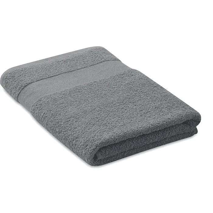 Prosop bumbac organic gri 140x70cm, texturat și plușat, cu bandă țesută subtilă pe margine