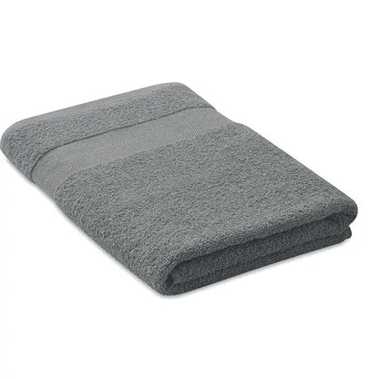 Prosop bumbac organic gri 140x70cm, texturat și plușat, cu bandă țesută subtilă pe margine