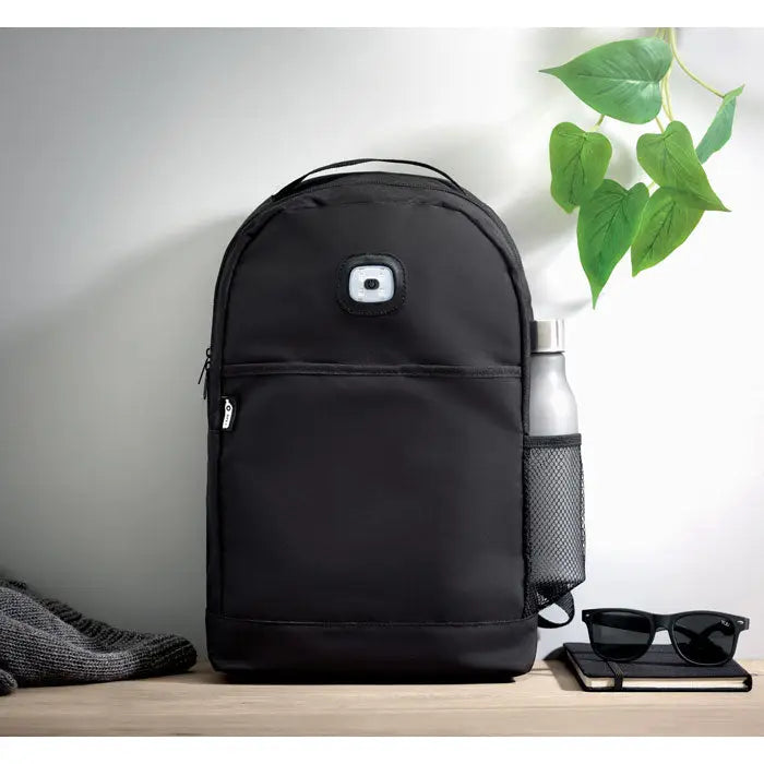Rucsac negru din rpet cu lumina led circulara pe fata si buzunar lateral din plasa