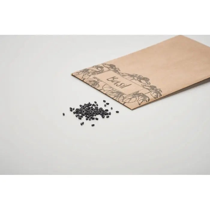 Plic de artizanat din hartie maro cu design floral si seminte negre de busuioc pentru gradinarit