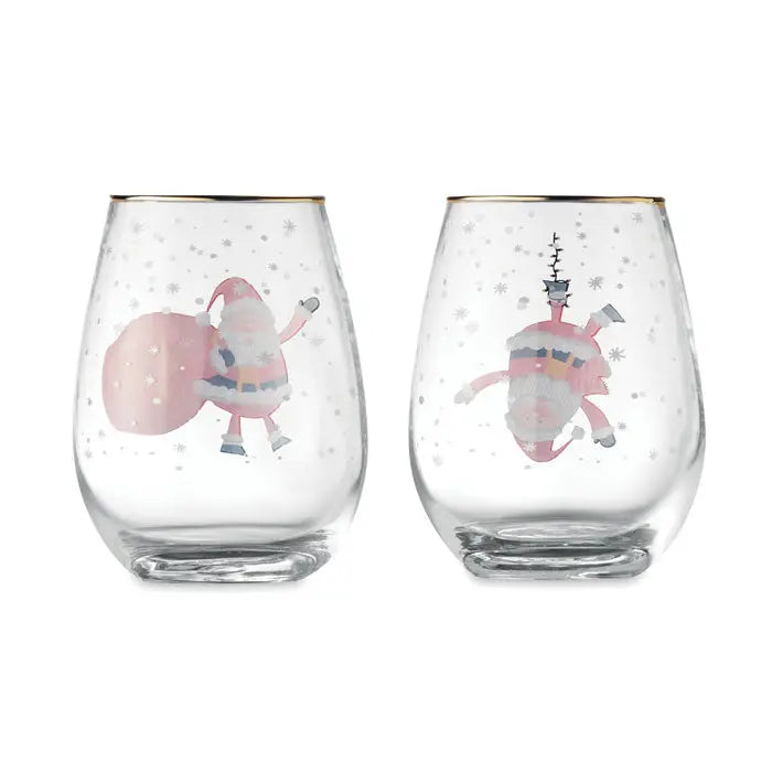 Set 2 pahare de craciun cu vin fără picior din sticlă transparentă cu margini aurii și ilustrații festive cu moș crăciun roz pe fundal de zăpadă