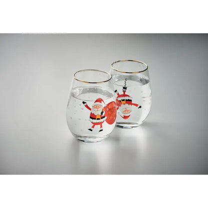 Set 2 pahare de craciun cu pahar de vin fara picior, decorati cu ilustratii festive cu mos craciun si margini aurii