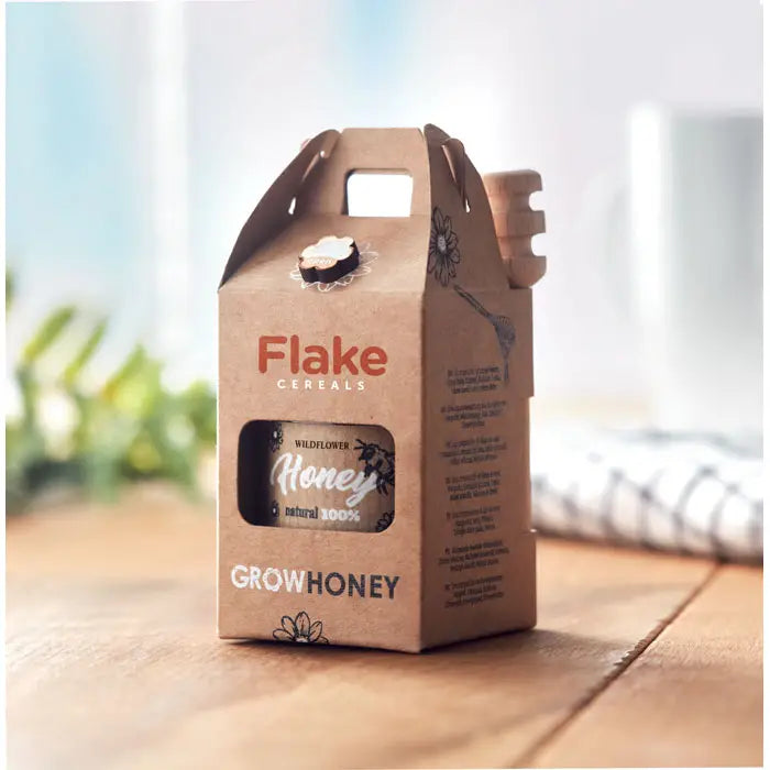 Cutie cadou maro din carton cu fereastra transparenta ce arata borcan cu miere de flori salbatice 50gr de la flake cereals