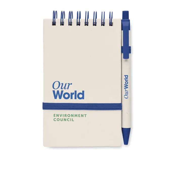 Set caiet de carton cu lapte a6 crem spiralat cu text albastru our world si pix alb cu accente albastre