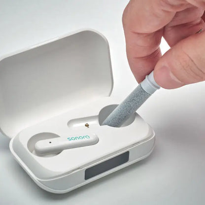 Set de curatare stilou tws cu casti earbud sonora albe minimaliste in carcasa de incarcare compacta