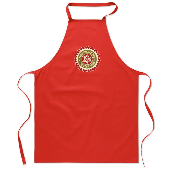 Sort de bucatarie din bumbac rosu cu emblemă festiva circulara aurie si verde cu textul christmas edition si the cook show