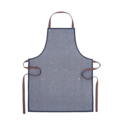 Sort din denim 240 gr/m² un sort albastru din denim cu bretele si margini maro din piele