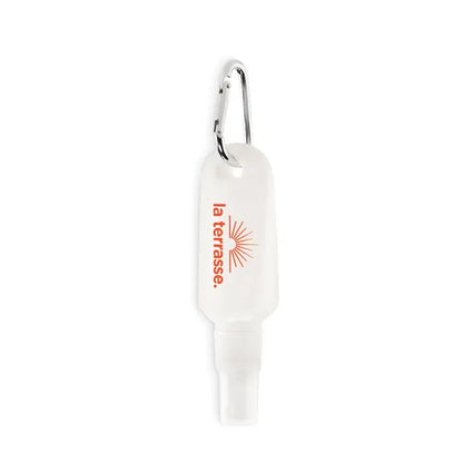 Flacon alb translucid din plastic pentru spray lotiune de protectie solara 30 ml cu clips argintiu si branding orange la terrasse