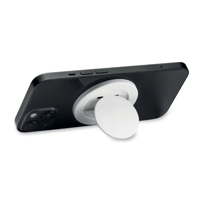 Suport magnetic alb pentru telefon montat pe spatele unui smartphone negru