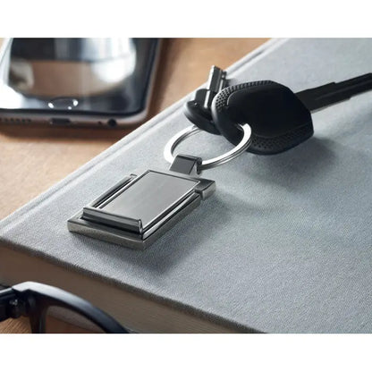 Suport metalic pentru telefon cu inel pentru chei argintiu dreptunghiular cu design modern si finisaj metalic mat