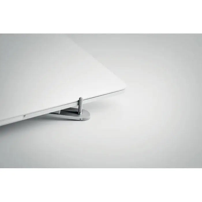 Suport pentru laptop pliabil argintiu din metal cu design minimalist si inaltime reglabila pentru birou eficient
