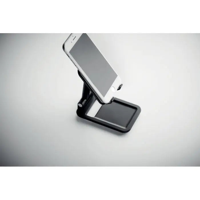 Suport pentru smartphone pliabil negru ajustabil din metal tinand un telefon alb