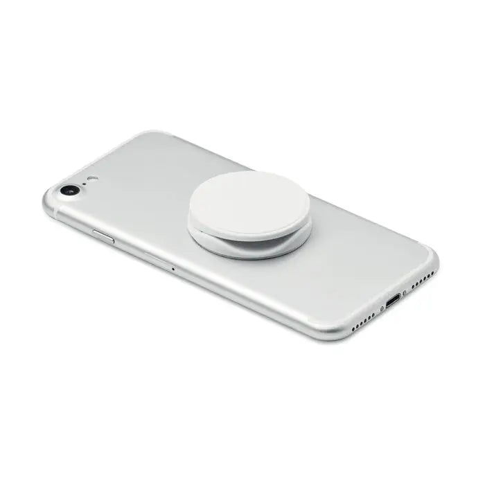 Suport rotund pentru telefon alb din plastic pe partea din spate a unui smartphone argintiu