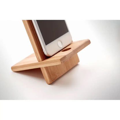 Suport pentru telefon din bambus maro deschis cu design minimalist si finisaj neted de lemn natural
