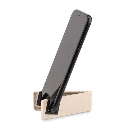 Suport telefon fibra de bambus pp bej ținând un smartphone negru pe suport vertical